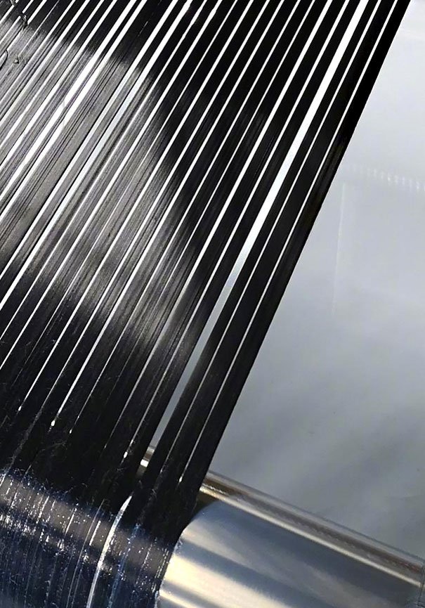 Weaving carbon fiber fabric